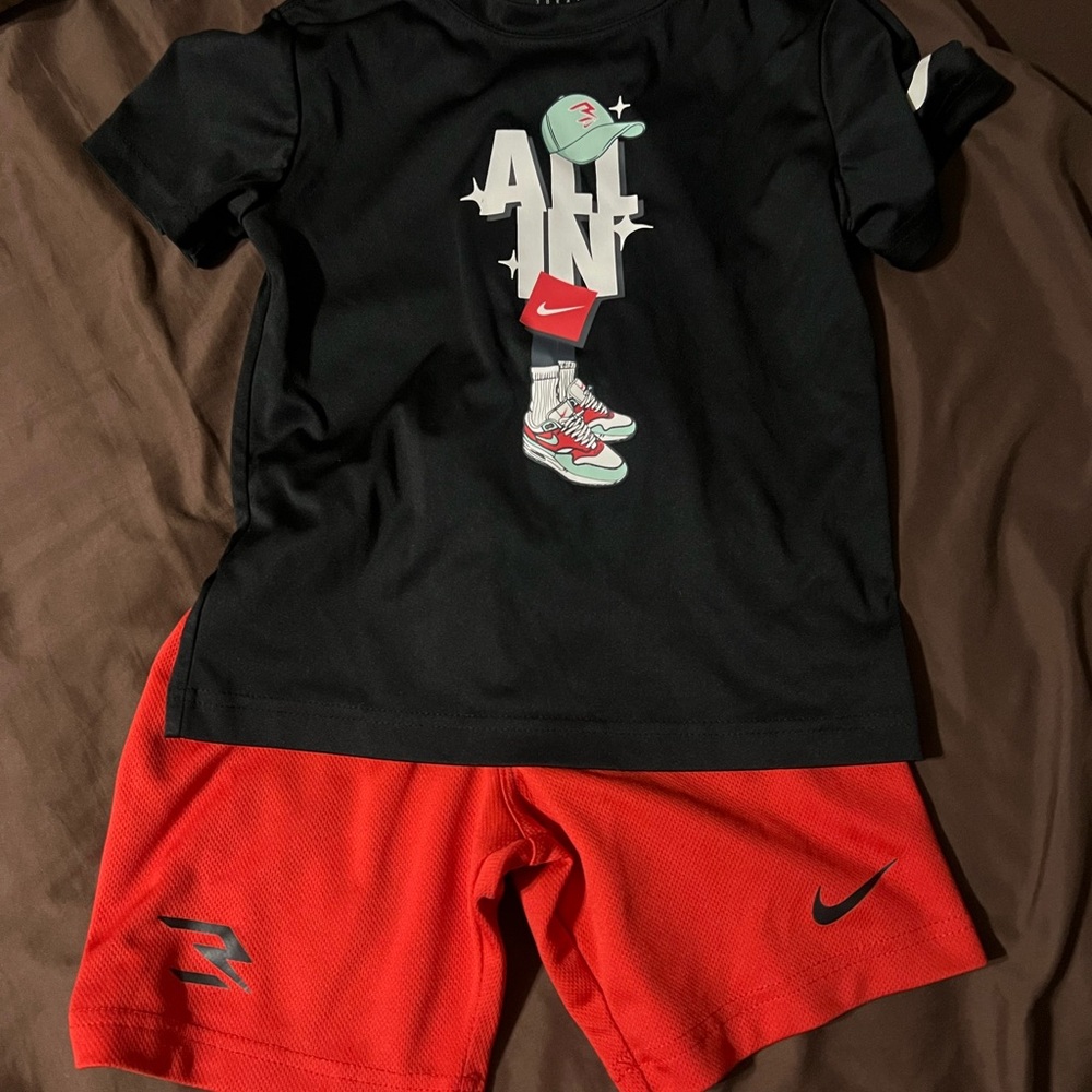 Nike Kids Black Tee with Red Graphic